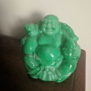 Jade colored buddha statue